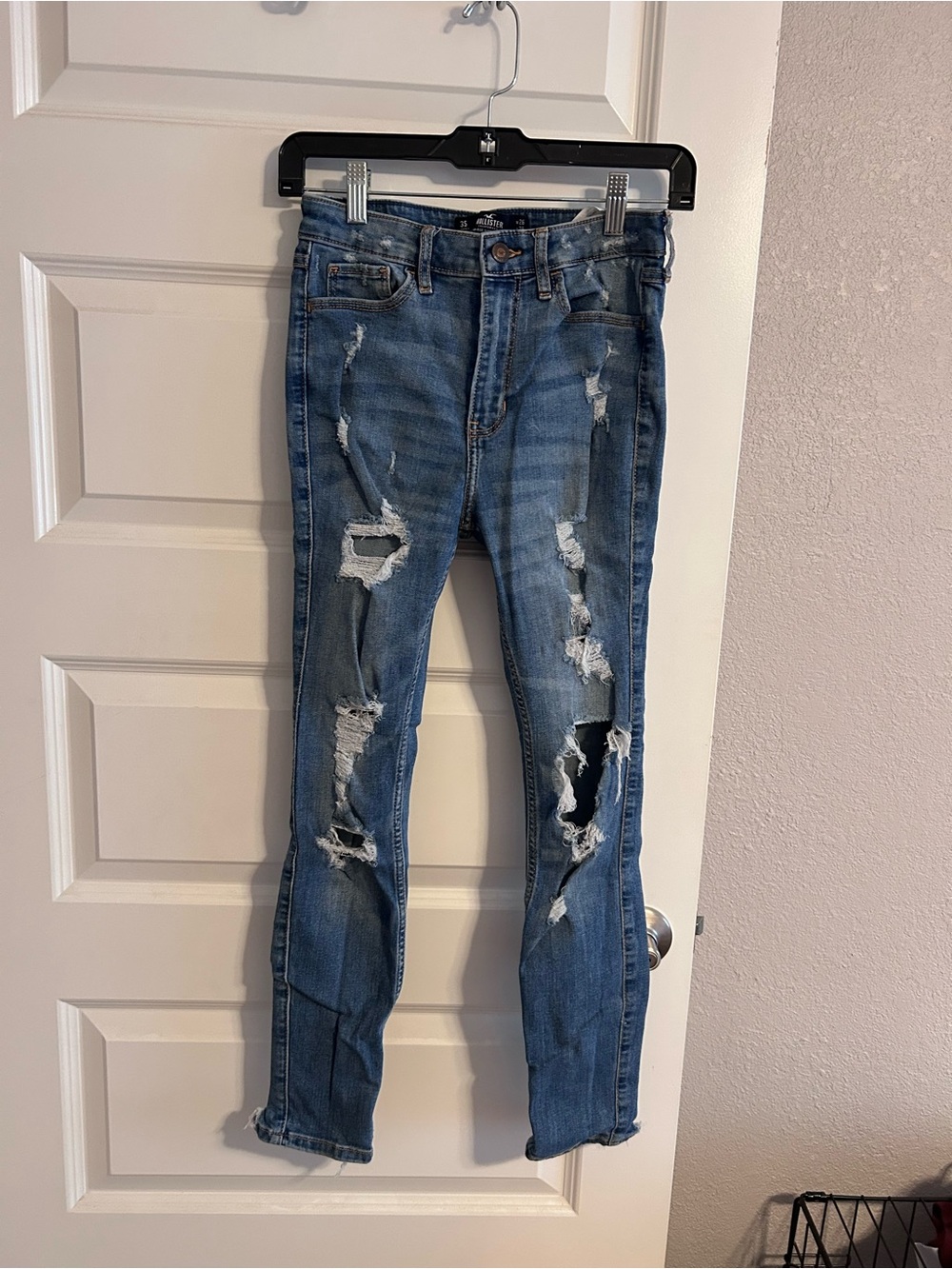 Hollister Distressed Skinny Jeans in Blue Wash